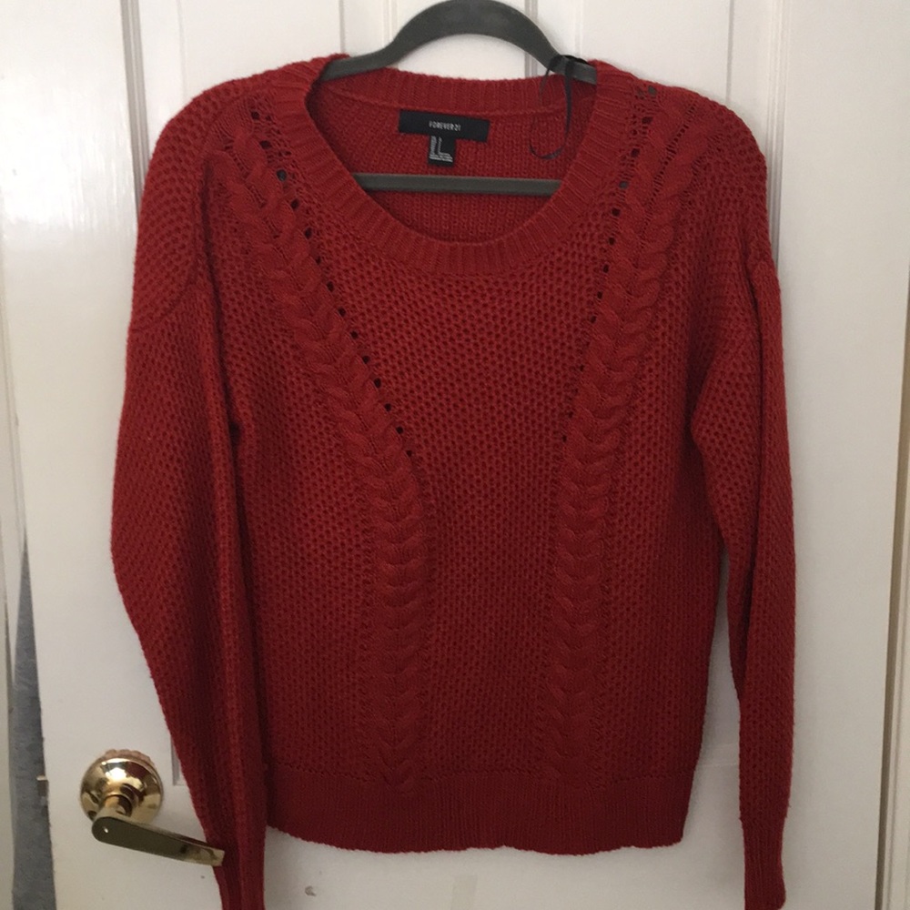 Orange knitted sweater